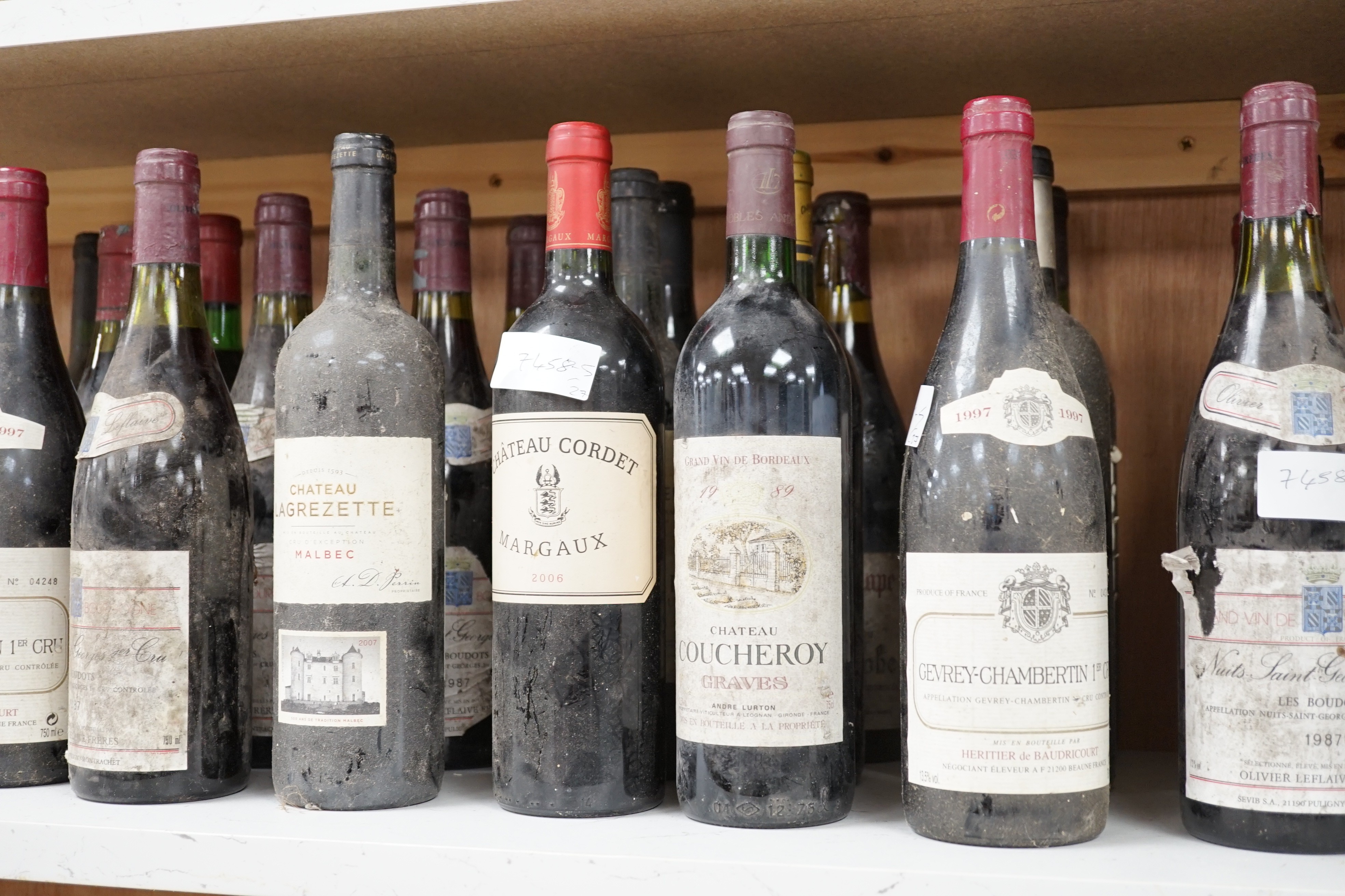 Twenty seven assorted bottles of Bordeaux and Burgundy: 6 bottles of Nuits St Georges 1er Cru 1987, 3 bottles of Chateau Lagrange Pomerol 1979, 2 bottles of Cotes de Brouilly 1988, 3 bottles of Gevrey-Chambertin 1er Cru